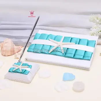 Sea star elegantné modré svadobná kniha hostí a nastavenie pera na pláži svadba tému dodávky